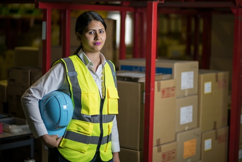 Female,Warehouse,Worker,With,Helmet,And,Safety,Vest. - Employee Rights Lawyer in Rochester, NY The Cimino Law Firm